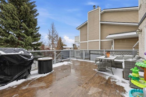 729 Woodbriar Place Sw, Calgary, AB - Outdoor With Deck Patio Veranda With Exterior
