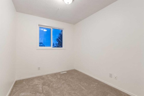 33 Martindale Court Ne, Calgary, AB - Indoor Photo Showing Other Room