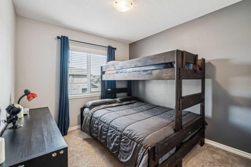 1565 Legacy Circle Se, Calgary, AB - Indoor Photo Showing Bedroom