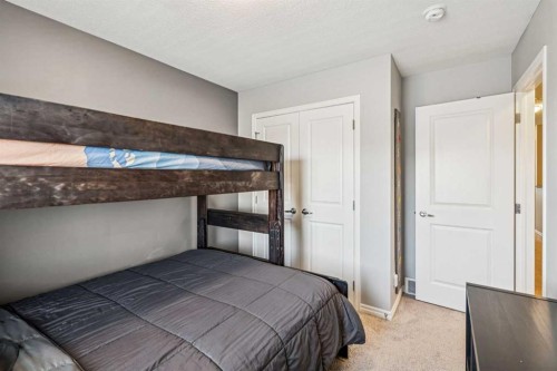 1565 Legacy Circle Se, Calgary, AB - Indoor Photo Showing Bedroom