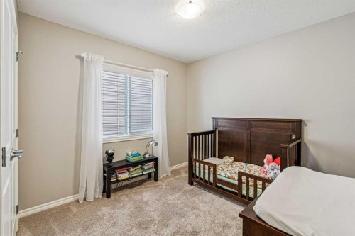 1565 Legacy Circle Se, Calgary, AB - Indoor Photo Showing Bedroom