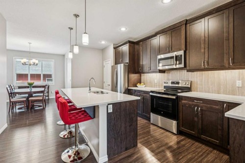 1565 Legacy Circle Se, Calgary, AB - Indoor Photo Showing Kitchen With Upgraded Kitchen