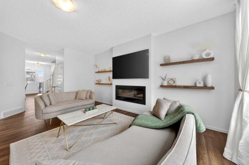 192 Cityspring Way Ne, Calgary, AB - Indoor Photo Showing Living Room With Fireplace