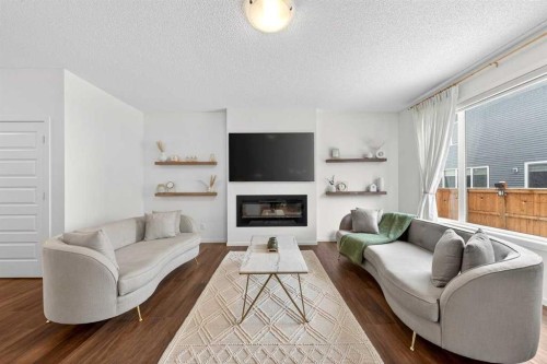 192 Cityspring Way Ne, Calgary, AB - Indoor Photo Showing Living Room With Fireplace