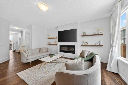 192 Cityspring Way Ne, Calgary, AB - Indoor Photo Showing Living Room With Fireplace