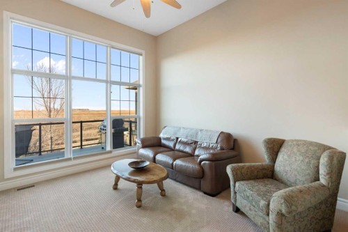 70 Muirfield Boulevard, Lyalta, AB - Indoor Photo Showing Living Room