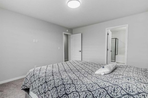 612 Seton Circle Se, Calgary, AB - Indoor Photo Showing Bedroom