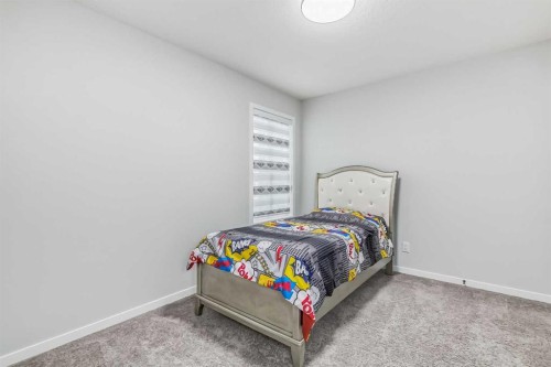 612 Seton Circle Se, Calgary, AB - Indoor Photo Showing Bedroom