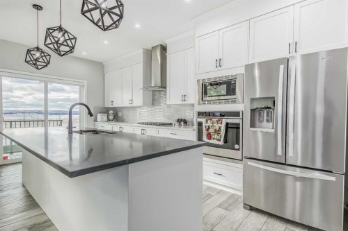 612 Seton Circle Se, Calgary, AB - Indoor Photo Showing Kitchen With Stainless Steel Kitchen With Upgraded Kitchen