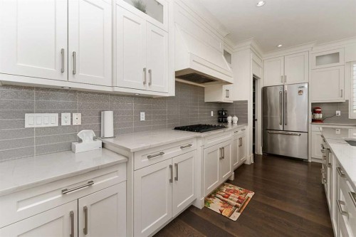 129 Kinniburgh Gardens, Chestermere, AB - Indoor Photo Showing Kitchen With Upgraded Kitchen