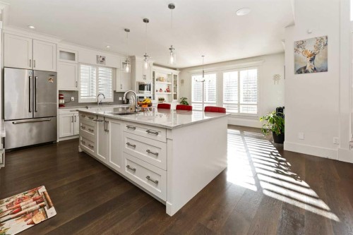 129 Kinniburgh Gardens, Chestermere, AB - Indoor Photo Showing Kitchen With Upgraded Kitchen