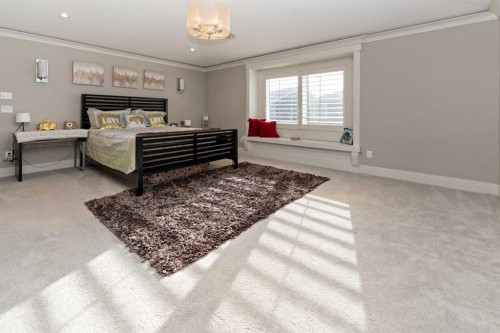 129 Kinniburgh Gardens, Chestermere, AB - Indoor Photo Showing Bedroom