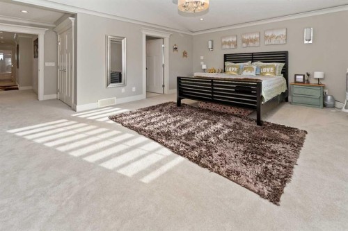 129 Kinniburgh Gardens, Chestermere, AB - Indoor Photo Showing Bedroom
