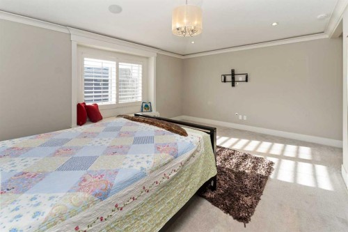 129 Kinniburgh Gardens, Chestermere, AB - Indoor Photo Showing Bedroom