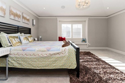 129 Kinniburgh Gardens, Chestermere, AB - Indoor Photo Showing Bedroom