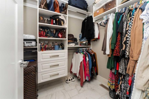 129 Kinniburgh Gardens, Chestermere, AB - Indoor With Storage
