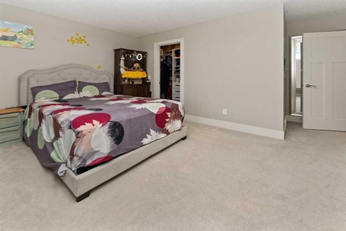 129 Kinniburgh Gardens, Chestermere, AB - Indoor Photo Showing Bedroom