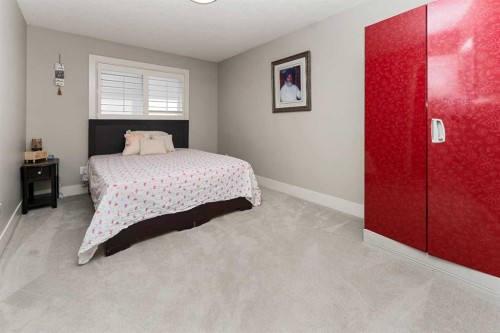 129 Kinniburgh Gardens, Chestermere, AB - Indoor Photo Showing Bedroom