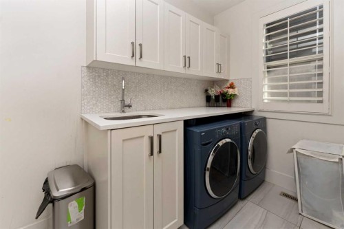 129 Kinniburgh Gardens, Chestermere, AB - Indoor Photo Showing Laundry Room