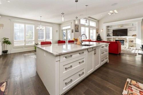 129 Kinniburgh Gardens, Chestermere, AB - Indoor Photo Showing Kitchen With Upgraded Kitchen