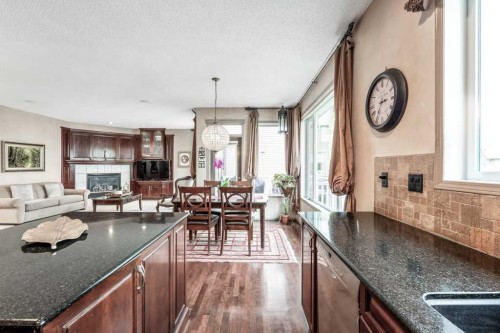 40 Cougar Ridge Heights Sw, Calgary, AB - Indoor With Fireplace