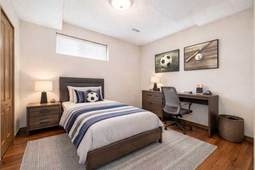 40 Cougar Ridge Heights Sw, Calgary, AB - Indoor Photo Showing Bedroom