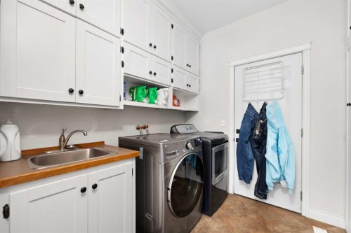 436 Ranchridge Bay Nw, Calgary, AB - Indoor Photo Showing Laundry Room