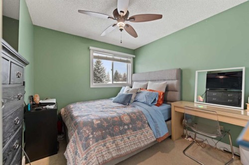 436 Ranchridge Bay Nw, Calgary, AB - Indoor Photo Showing Bedroom
