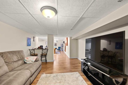 436 Ranchridge Bay Nw, Calgary, AB - Indoor Photo Showing Living Room