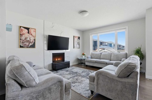 338 Red Sky Terrace Ne, Calgary, AB - Indoor Photo Showing Living Room With Fireplace