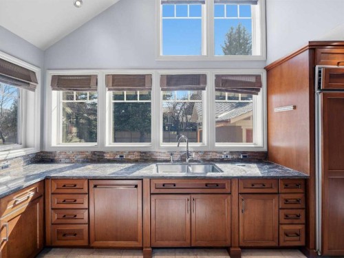 10703 Willowgreen Drive Se, Calgary, AB - Indoor Photo Showing Kitchen With Double Sink