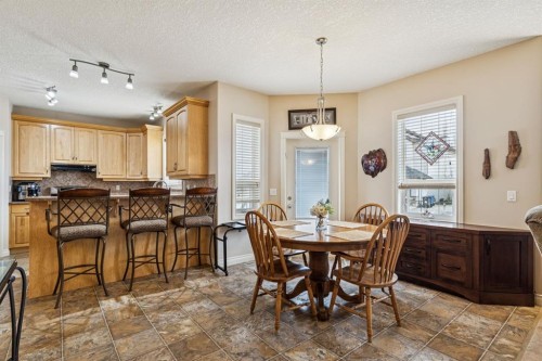 937 Cimarron Park Close, Okotoks, AB - Indoor Photo Showing Dining Room