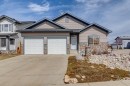 937 Cimarron Park Close, Okotoks, AB  - Outdoor With Facade 