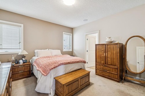 937 Cimarron Park Close, Okotoks, AB - Indoor Photo Showing Bedroom