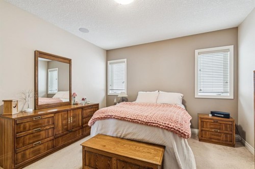 937 Cimarron Park Close, Okotoks, AB - Indoor Photo Showing Bedroom