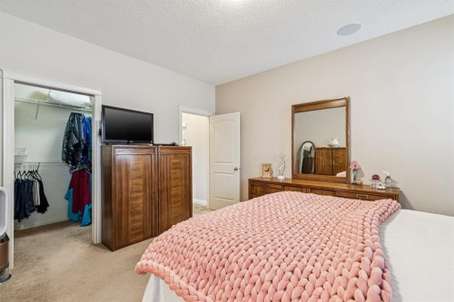 937 Cimarron Park Close, Okotoks, AB - Indoor Photo Showing Bedroom