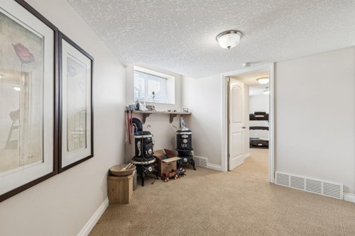 937 Cimarron Park Close, Okotoks, AB - Indoor Photo Showing Other Room