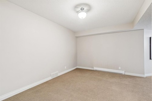 937 Cimarron Park Close, Okotoks, AB - Indoor Photo Showing Other Room