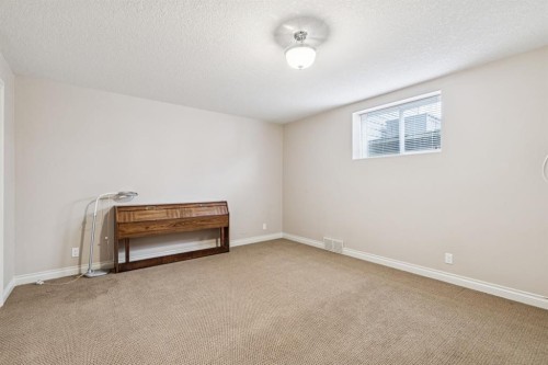 937 Cimarron Park Close, Okotoks, AB - Indoor Photo Showing Other Room