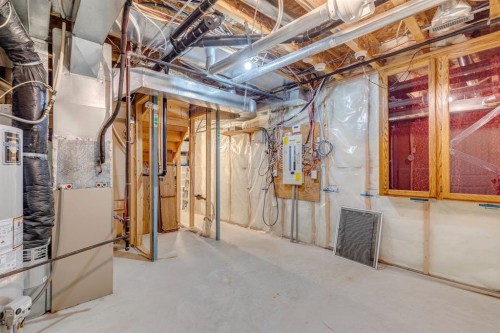 937 Cimarron Park Close, Okotoks, AB - Indoor Photo Showing Basement