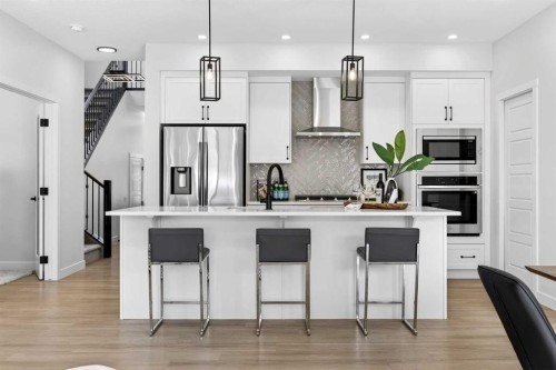 997 Alpine Drive Sw, Calgary, AB - Indoor Photo Showing Kitchen With Upgraded Kitchen