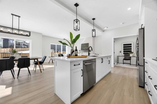 997 Alpine Drive Sw, Calgary, AB - Indoor Photo Showing Kitchen With Upgraded Kitchen