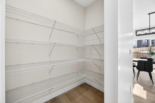 997 Alpine Drive Sw, Calgary, AB - Indoor With Storage