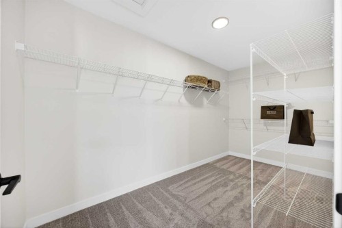 997 Alpine Drive Sw, Calgary, AB - Indoor With Storage
