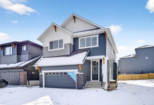 997 Alpine Drive Sw, Calgary, AB - Outdoor With Facade
