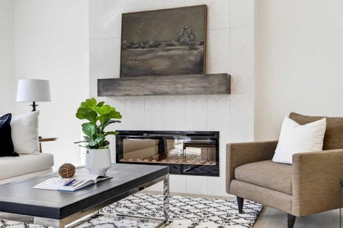 997 Alpine Drive Sw, Calgary, AB - Indoor Photo Showing Living Room With Fireplace