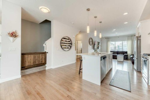 204 Sundown Road, Cochrane, AB - Indoor Photo Showing Kitchen With Upgraded Kitchen