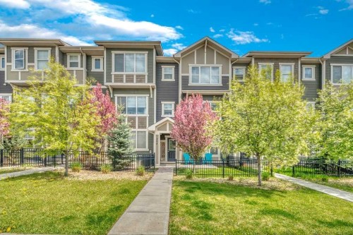 204 Sundown Road, Cochrane, AB - Outdoor With Facade