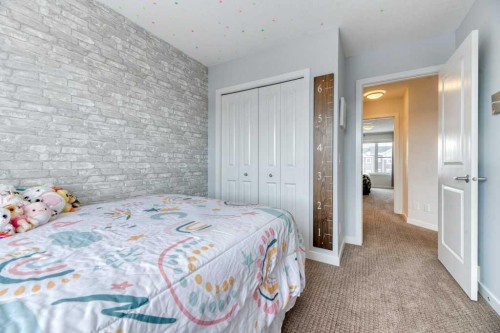 204 Sundown Road, Cochrane, AB - Indoor Photo Showing Bedroom