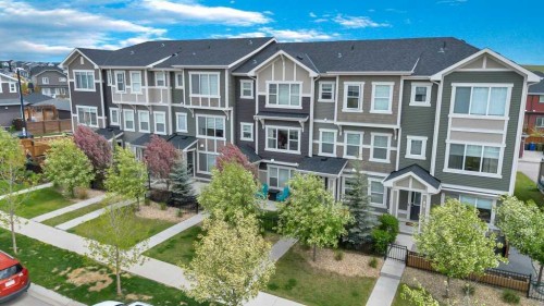 204 Sundown Road, Cochrane, AB - Outdoor With Facade